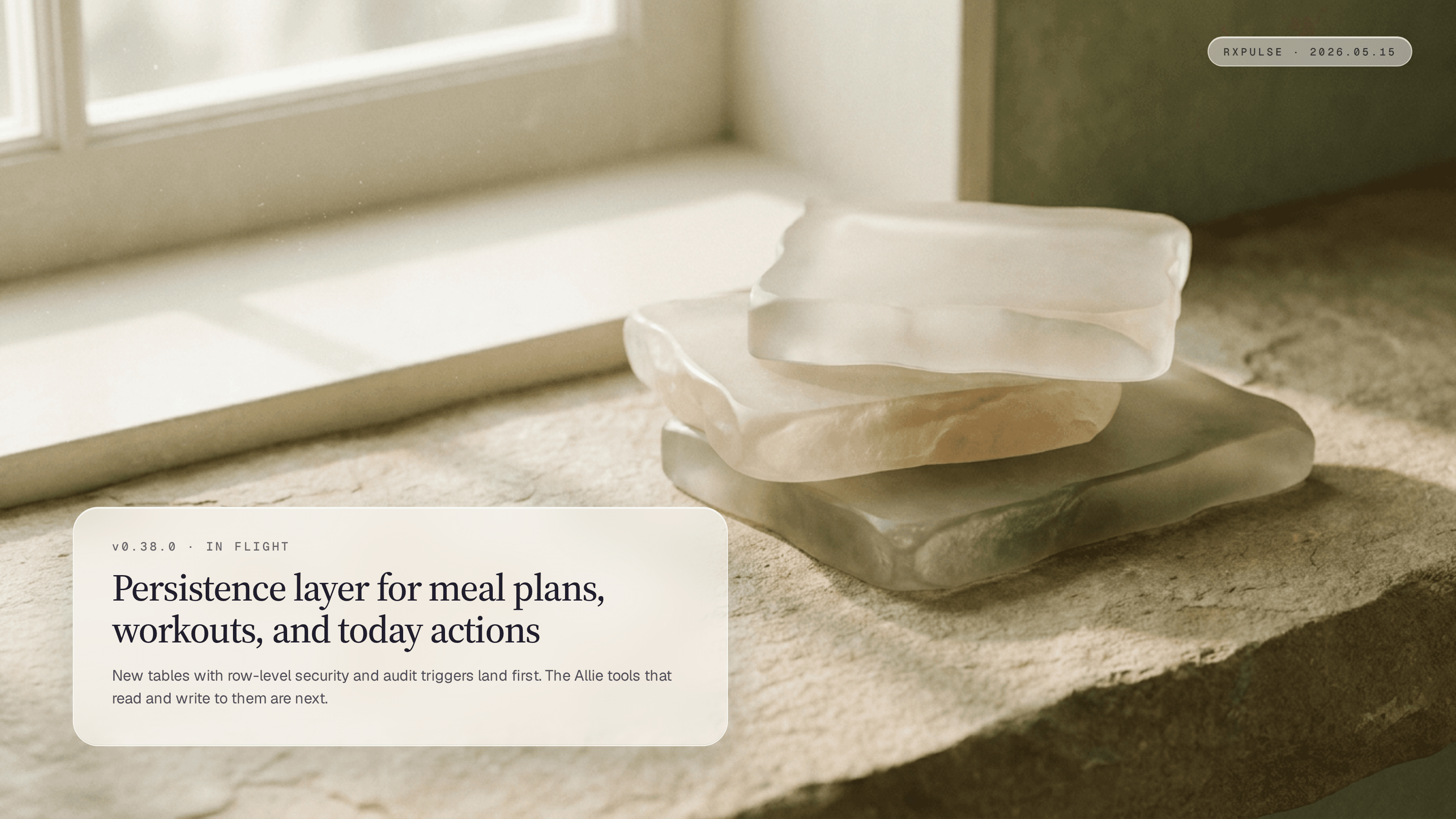 Editorial launch artwork. Three translucent rectangular stones stacked offset on a soft cream and warm-stone backdrop with hints of moss, paired with a glass caption card naming the persistence groundwork release.