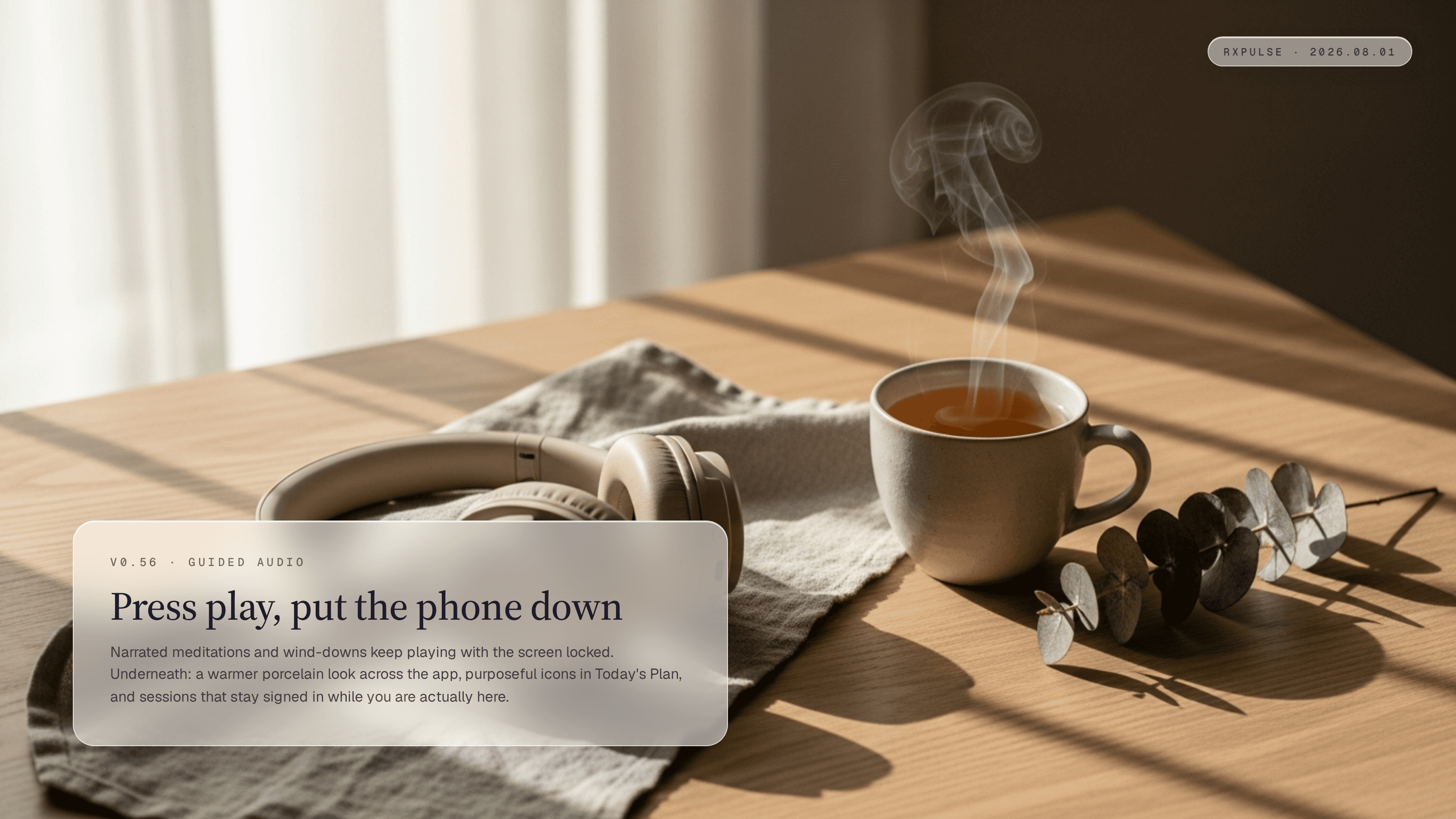 Release hero art: beige over-ear headphones and a steaming cup of tea on warm linen in soft morning light, captioned "Press play, put the phone down."