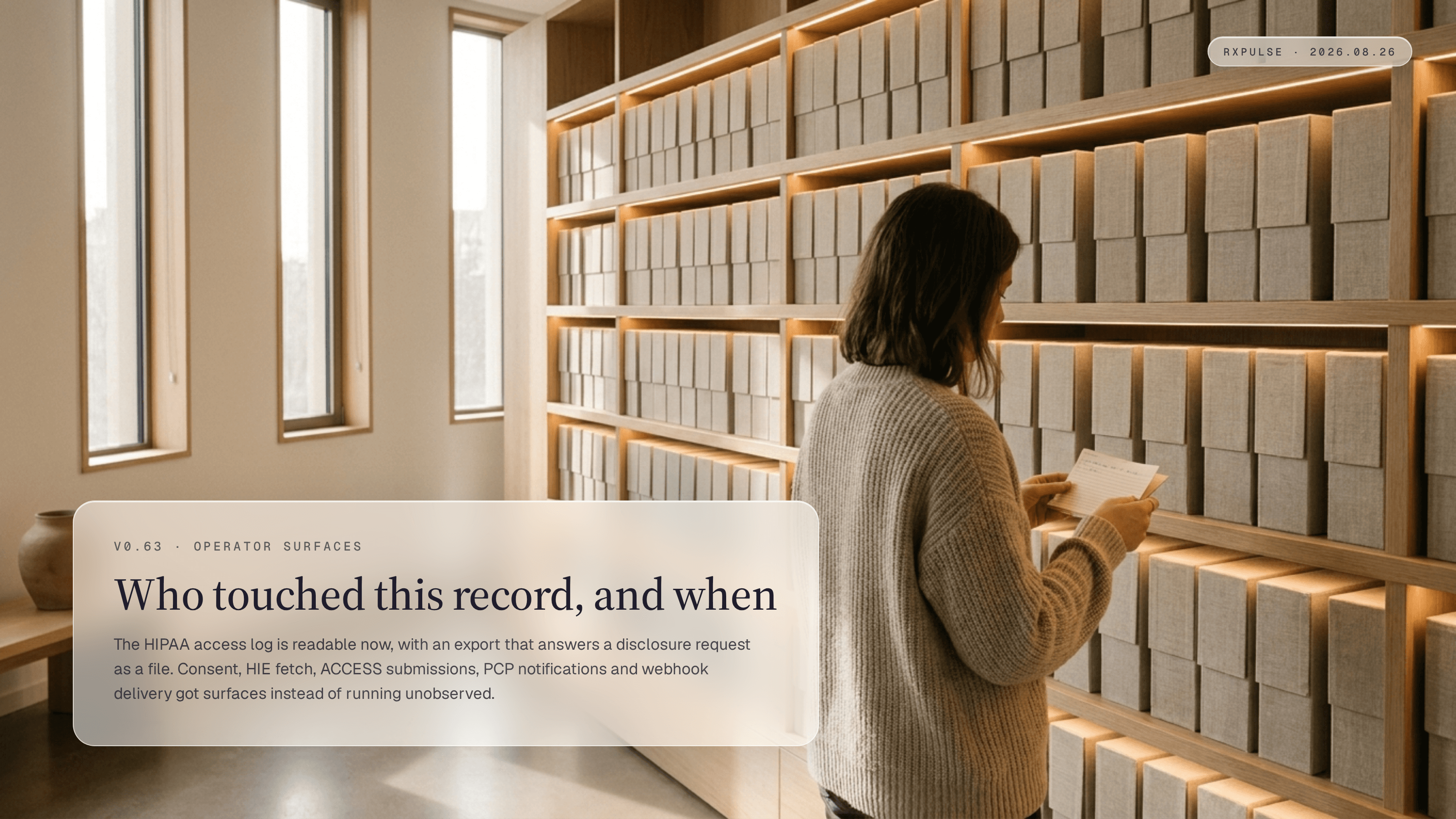 Release hero art: a sunlit archive room of pale oak shelving holding rows of linen record boxes, each box front carrying a slim band of warm light, with one person standing at the shelves reading a single pulled index card. Captioned "Who touched this record, and when."